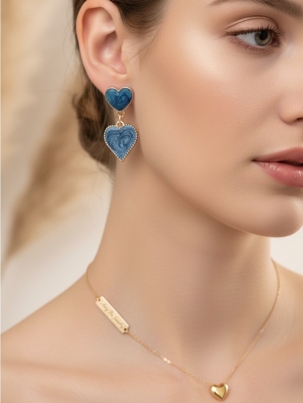 Gold-Plated Double Blue Heart Drop Earrings.